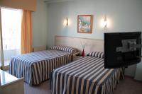 Postel nebo postele na pokoji v ubytování Hotel Mediterráneo