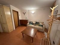 Posedenie v ubytovaní Appartamento LO SCOIATTOLO
