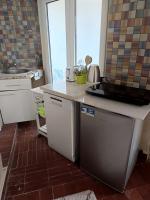 Kuchyň nebo kuchyňský kout v ubytování Holiday Home Ille