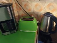 Příslušenství pro přípravu čaje a kávy v ubytování Holiday Home Ille