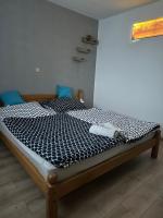 Postel nebo postele na pokoji v ubytování Ubytování Niagara