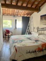 Posteľ alebo postele v izbe v ubytovaní Agriturismo La Roverella