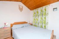 Posteľ alebo postele v izbe v ubytovaní House Small Robinson
