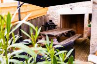 Posedenie v ubytovaní Gîte et SPA Chez Jules