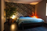 Posteľ alebo postele v izbe v ubytovaní Gîte et SPA Chez Jules