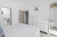 Ein Bett oder Betten in einem Zimmer der Unterkunft Teign View, Grand Banks