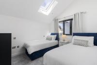 Ein Bett oder Betten in einem Zimmer der Unterkunft Teign View, Grand Banks