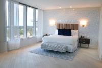 Ein Bett oder Betten in einem Zimmer der Unterkunft Scarlet Pearl Casino Resort
