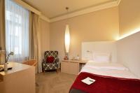Postel nebo postele na pokoji v ubytování Best Western Premier Hotel Victoria