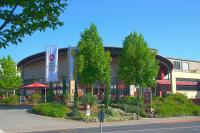 a building with a restaurant in front of a street at Best Western Plus Konrad Zuse Hotel in Hünfeld