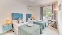 Postel nebo postele na pokoji v ubytování Puerto Banús Dreamed Villa Monelos