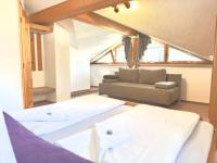 Łóżko lub łóżka w pokoju w obiekcie Ferienwohnung Vesna & Alex