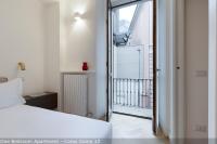 A bed or beds in a room at Brera Apartments in Garibaldi