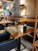 Restauracja lub miejsce do jedzenia w obiekcie Hôtel Influences La Bresse