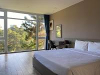 Ein Bett oder Betten in einem Zimmer der Unterkunft Lan Anh Villas Resort