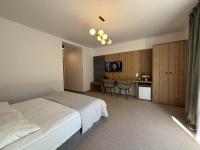 Posteľ alebo postele v izbe v ubytovaní Resort EDEN domki, apartamenty i pokoje