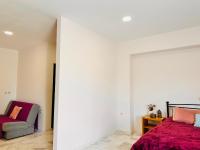 Postel nebo postele na pokoji v ubytování Dolce Vita Apartments - Spacious Renovated Apartments with Unique Decor Perfect for 4 in Laganas Ideal for Fun and Relaxation By Villa Mana Gers