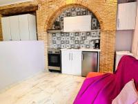 Kuchyň nebo kuchyňský kout v ubytování Dolce Vita Apartments - Spacious Renovated Apartments with Unique Decor Perfect for 4 in Laganas Ideal for Fun and Relaxation By Villa Mana Gers