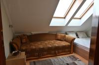 A seating area at Liszkai Apartman