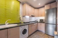 Kuchyň nebo kuchyňský kout v ubytování Apartamento Aravirma
