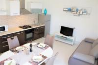 Kuchyňa alebo kuchynka v ubytovaní Apartments Olive Garden
