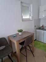 Kuchyňa alebo kuchynka v ubytovaní Apartments Olive Garden