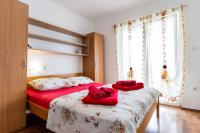 Posteľ alebo postele v izbe v ubytovaní Apartments Nada