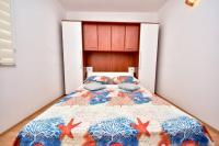 Posteľ alebo postele v izbe v ubytovaní Apartment Roko
