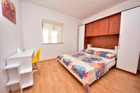 Posteľ alebo postele v izbe v ubytovaní Apartment Roko