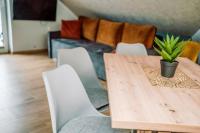 Posedenie v ubytovaní Apartamenty Majer Łeba