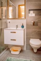 Kúpeľňa v ubytovaní Apartamenty Majer Łeba