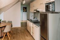 Kuchyňa alebo kuchynka v ubytovaní Apartamenty Majer Łeba