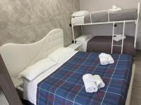A bed or beds in a room at B&B The Dream