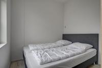 Postel nebo postele na pokoji v ubytování Vakantiehuis Beau - Julianadorp aan Zee