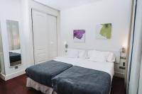 Postel nebo postele na pokoji v ubytování Hostal Acuarela