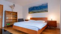 Postel nebo postele na pokoji v ubytování Holiday House Mária