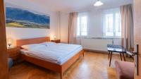 Postel nebo postele na pokoji v ubytování Holiday House Mária