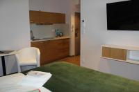 TV a/nebo společenská místnost v ubytování Apartments 461