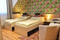 Postel nebo postele na pokoji v ubytování Apartments 461