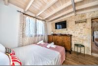 Postel nebo postele na pokoji v ubytování Guest House Aphrodite
