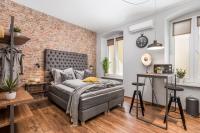 Posteľ alebo postele v izbe v ubytovaní Porto Marina apartments