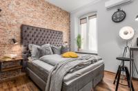 Posteľ alebo postele v izbe v ubytovaní Porto Marina apartments