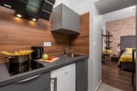 Kuchyňa alebo kuchynka v ubytovaní Porto Marina apartments