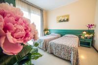 Posteľ alebo postele v izbe v ubytovaní Hotel Eden