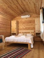 Postel nebo postele na pokoji v ubytování Suzi'nin Bahçesi Bungalov Evler