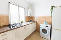Kuchyňa alebo kuchynka v ubytovaní La Villa Suite Málaga