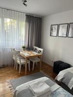 Posteľ alebo postele v izbe v ubytovaní Apartament Centrum