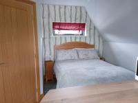 Postel nebo postele na pokoji v ubytování Silver Birch Lodge