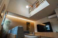 TRIGON Hotel FUKUOKAにあるテレビまたはエンターテインメントセンター