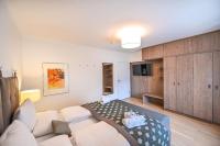 Telewizja i/lub zestaw kina domowego w obiekcie Apartmenthaus Pastner am Teich